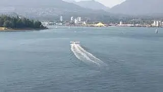 plane taking off Vancouver Harbor