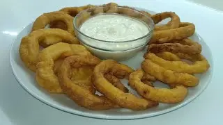 Crispy snack - onion rings in batter