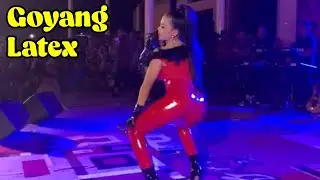 She Perform Dangdut Music With Red Latex Vinyl
