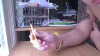 how to spin a pencil through your fingers