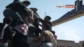 8-4 Daraa أوغاريت || تحطيم صنم آخر للمقبورحافظ الأسد في درعا