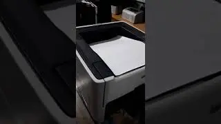 Hp 1320 Printer Dual Side Printing in progress