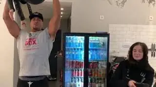 strongman overhead lifts girl