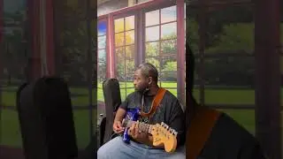 Live playing guitar at church