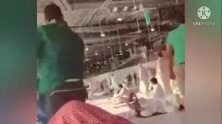 An ISIS terrorist carrying a weapon fires bullets inside the Grand Mosque in Mecca