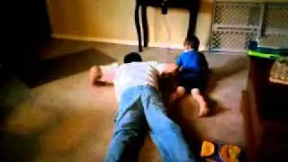 Son trying to be like daddy