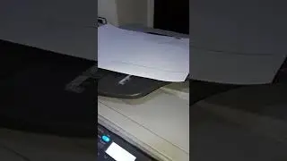 mencoba tes fotokopi dulu di mesin fotocopy ini