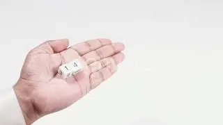 Hand Holds Numbered Dice One And Four Fourteen | Stock Footage - Envato elements