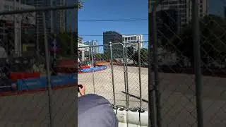 Sergio Perez does burnouts with the RB7 F1 car at the Red Bull Showrun in Dallas, Texas