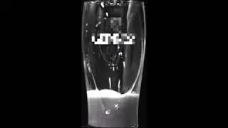 Bubble cascade in Guinness beer is caused by gravity current instability