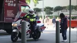Person Standing on the Street Stopping Traffic as the SIGN for HELP!!