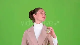 Seller of Cosmetics Advertises a Pleasant Fragrance of Perfume. Green Screen | Stock Footage -