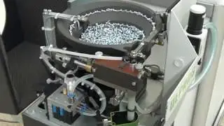 Watch a screw feeder's vibratory bowl in motion