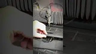 Desktop Waterjet cutting a Laptop