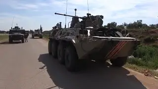 SYRIA: RUSSIAN MILITARY POLICE PATROLS THE M4 HIGHWAY IN IDLIB