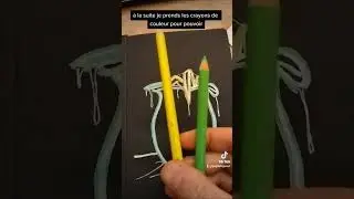 Dessin sur papier noir effet néon sur un carnet de croquis acheté chez Action.