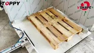 Stationary pallet changer 