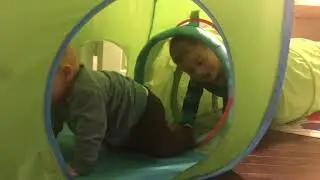 Penn and Bo play in their Ikea tunnel and tent