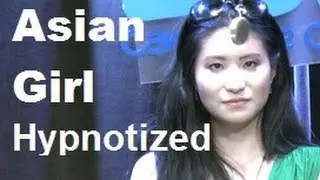 Asian girl hypnotized on live TV - spinning pocket watch hypnosis induction