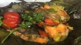 TRADITIONAL FISH IN BANANA LEAVES  (MABOKE)