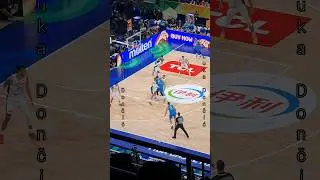 Luka Doncic is passing between 2 Lithuanian defenders #fiba #basketball #slovenia #dallas #mavericks
