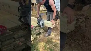 How to cut and set a deck post using post protectors for ground contact