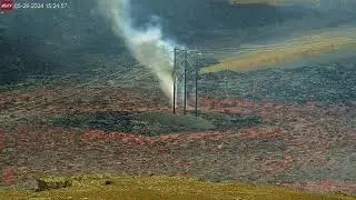 Lonely Power Pole Catches Fire Surrounded by a River of Lava, Iceland