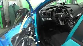 Repairing door checks on a Mazda 3 BL