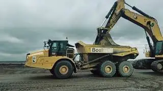 CAT 395 EXCAVATOR TRANSPORT USING WHEELS
