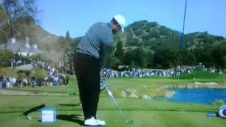 Why does Tiger have that wonky practice swing?
