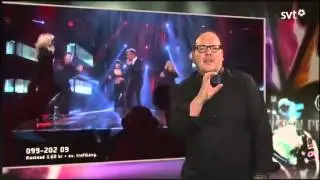 Man translating Swedish song to sign language.