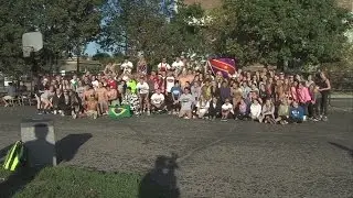 Nearly Naked: College students strip down to help community