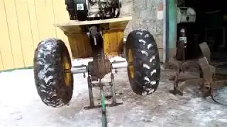 A stand, lift, and jack for walk-behind tractors is a handy tool when changing wheels.