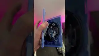 How to open a game disc and still keep the wrapper intact.