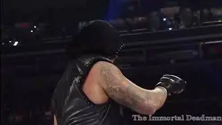 UNDERTAKER AND KANE PAY RESPECT TO PAUL BEARER.
