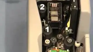 Digital Check Cleaning the Main Drive Rollers in the TS230 Using Swabs