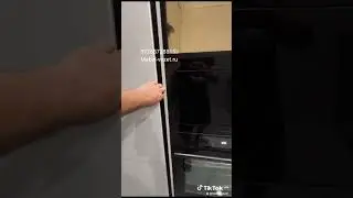 Кухня до потолка угловая стильными рефлеными фасадами МДФ.