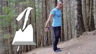 Urcarea cu bete pe poteci de munte