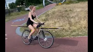 Mariya Koptyeva driving on solar-bike