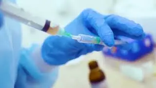 doctor holds in his hand a syringe with plasma or 2022 08 10 19 41 26 utc