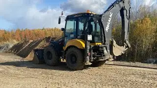 Как можно легко выехать на экскаваторе погрузчике если застряли Mecalac TLB990