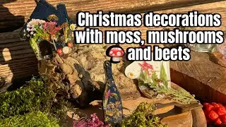 Christmas decorations with moss, mushrooms, and bees epoxy resin