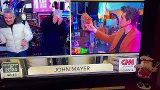 John Mayer speaks to Anderson Cooper and Andy Cohen from a Japanese cat bar CNNNYE 2024