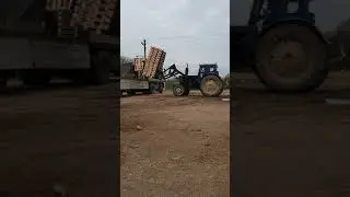 погрузка деревянных поддонов.