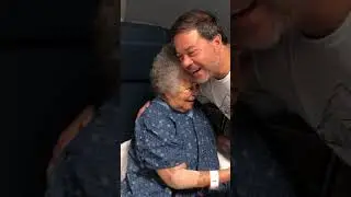 Dad and grandma tickle in the hospital