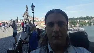 Karlův most (Charles Bridge) in Prague and a nice Street musicians.