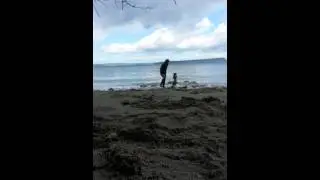 Hansville beach cairn building(1)