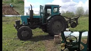 Распашка целины трактором Т-40АМ с плугом плн 2-35  под засев гречихи . 11 .