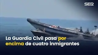 La Guardia Civil pasa por encima de una lancha motora con cuatro migrantes