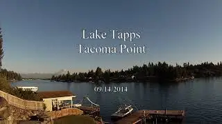 Wake surfing at Lake Tapps on a sunny Sunday afternoon - Centurion boat loaded with fat sacks
